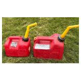 Five 1, 1.5 and 5 Gallon Gas Cans