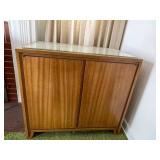 Vintage Wooden Cabinet with Glass Top and Doily Design