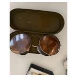 Assorted Collectible Items Including Brazing Glasses, Watches, Rosary, and Trinkets