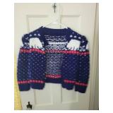 Collection of Vintage Clothing Featuring Sweaters and Jackets