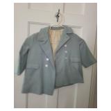 Collection of Vintage Clothing Featuring Sweaters and Jackets