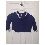 Collection of Vintage Clothing Featuring Sweaters and Jackets