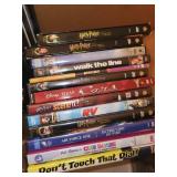 Collection of Assorted DVDs Including Movies and Series