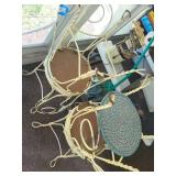 Four Vintage Wrought Iron Chairs with Woven Seat Cushions