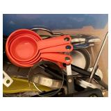Collection of Kitchen Utensils and Tools in Storage Bin