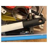 Collection of Kitchen Utensils and Tools in Storage Bin