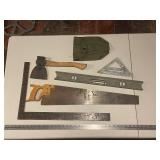 Collection of Vintage Tools Including Saws and Hatchet