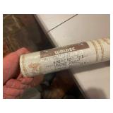 Collection of Vintage Wallpaper Rolls with Various Patterns