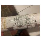 Collection of Vintage Wallpaper Rolls with Various Patterns