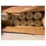 Collection of Vintage Wallpaper Rolls with Various Patterns