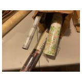 Collection of Vintage Wallpaper Rolls with Various Patterns