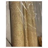 Collection of Vintage Wallpaper Rolls with Various Patterns