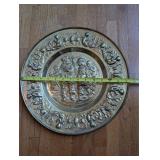 Embossed Brass Wall Plate with Historical Figure Design