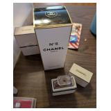 Collection of Vintage Perfume Bottles and Chanel Items