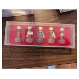 Collection of Vintage Perfume Bottles and Chanel Items