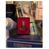 Collection of Vintage Perfume Bottles and Chanel Items