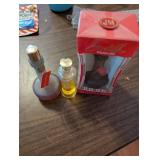 Collection of Vintage Perfume Bottles and Chanel Items