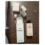 Collection of Vintage Perfume Bottles and Chanel Items