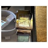 Collection of 4 Wristwatches including Timex, Calvin Klein, and Gossip