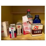 Collection of Vintage Spice Tins, Extracts, and Baking Ingredients