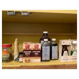 Collection of Vintage Spice Tins, Extracts, and Baking Ingredients