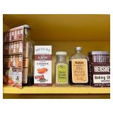 Collection of Vintage Spice Tins, Extracts, and Baking Ingredients