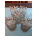 5 VINTAGE/ANTIQUE WOULFF BOTTLES