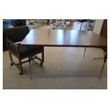 TABLE AND CUSHIONED CHAIR