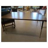 TABLE AND CUSHIONED CHAIR