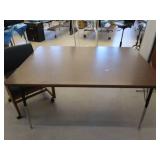 TABLE AND CUSHIONED CHAIR