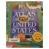 OVERSIZED PAPERCUTTER AND BOOKS