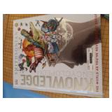 OVERSIZED PAPERCUTTER AND BOOKS