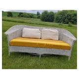 Awesome Wicker Couch with recovered Cusion and Throw Pillows