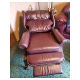 Gorgeous Vintage Barcalounger Reclining Chair. Notice the Wooden Carved Claw Foot Legs and Awesome Classy Studded Seams and Beautiful Red Leather.  This is a gorgeous Chair that Sells for over $1500