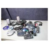 Electronics Assortment: CD Players, GPS Devices, Speakers, and More
