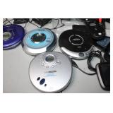 Electronics Assortment: CD Players, GPS Devices, Speakers, and More