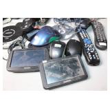 Electronics Assortment: CD Players, GPS Devices, Speakers, and More