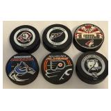 (6) NHL Official Game Pucks - Lightning, Sabres, Canucks, Flyers, Capitals, Coyotes