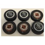 (6) NHL Official Game Pucks - Lightning, Sabres, Canucks, Flyers, Capitals, Coyotes