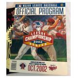 (7) Minnesota Twins Baseball Publications - 1992 Yearbook, 1993-94 Calendar, 2002 ALCS Official Program, 2002 DivisionS eries Programs, 2003 Yearbooks