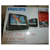 2 portable LCD screens for the kids to watch in the vehicle - used