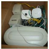 Box of computer speakers and apple eero wifi extender