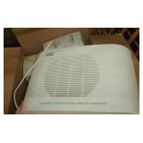 Box of computer speakers and apple eero wifi extender