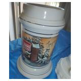 Hamms and Budweiser steins, golf club cover, Harley Davidson beer can