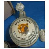 Hamms and Budweiser steins, golf club cover, Harley Davidson beer can