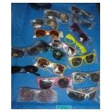 18 pair of new sunglasses mostly adult