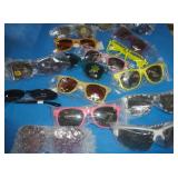18 pair of new sunglasses mostly adult