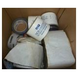 Box of different kinds of tape and sealant