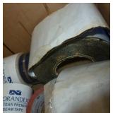 Box of different kinds of tape and sealant