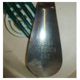 Vintage airplane with folding wings, RCA/Victor radio, jewelry, trick magnetic dogs, hair pin, Shoe horns